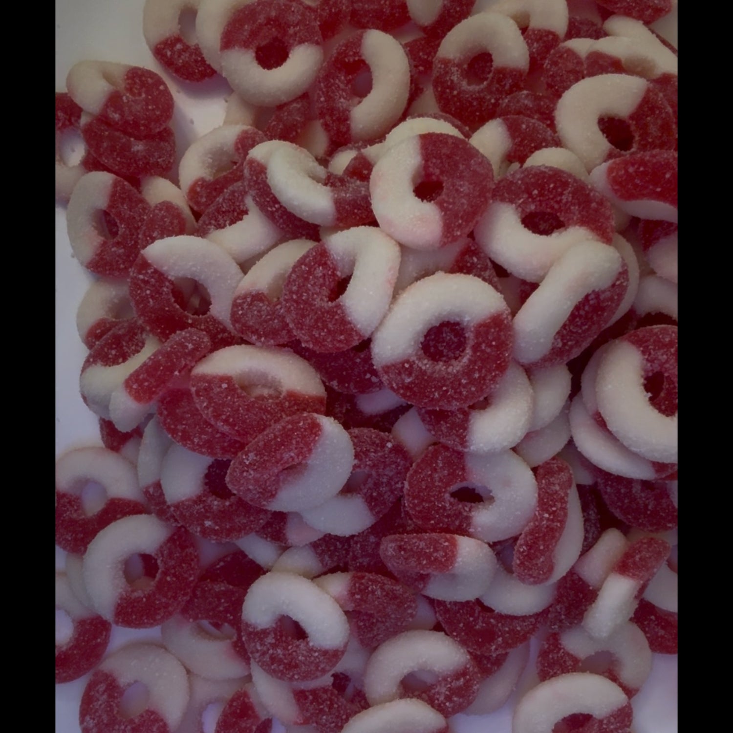 Fire cherry rings coated in our homemade chamoy 16 oz container